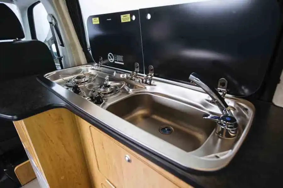 A close-up look at the sink and two burner hob  (Click to view full screen)