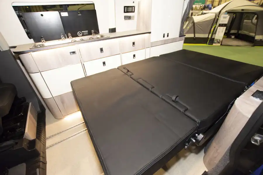 The fold down bed in the WildAx Proteus campervan (Click to view full screen)