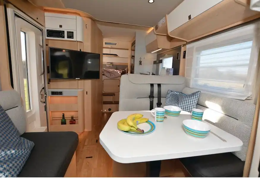 The Hymer B-Class ModernComfort T 550 WhiteLine low-profile motorhome view aft (Click to view full screen)
