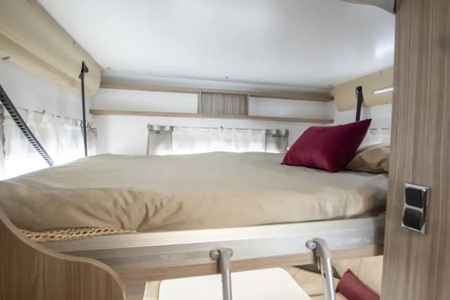 The drop down bed in the rear of the Benimar Tessoro 482 motorhome (Click to view full screen)