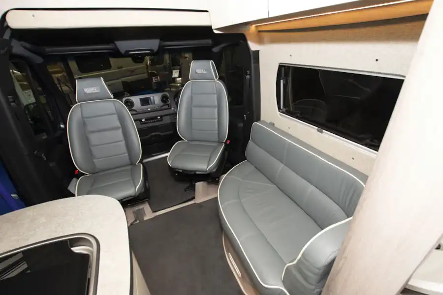 The lounge seating in the WildAx Elara campervan (Click to view full screen)