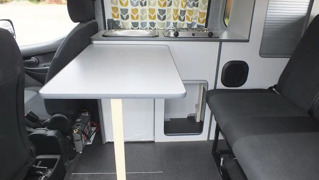 The lounge in the Small Campervan Nissan e-NV200 (Click to view full screen)