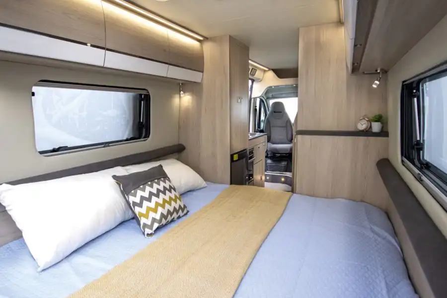 The double bed in the Benimar Benivan 122 campervan (Click to view full screen)