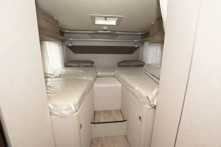 The bedroom in the Hymer Exsis-i 580 motorhome (Click to view full screen)