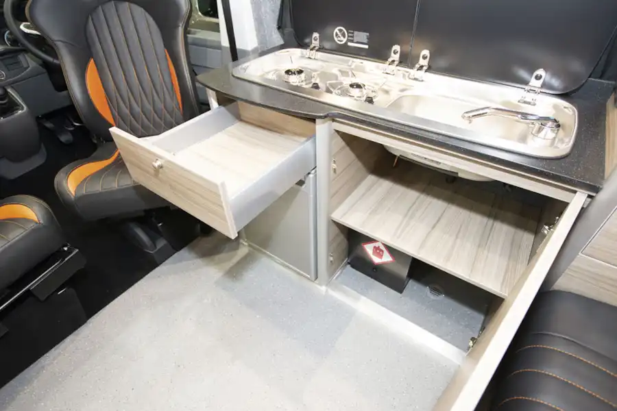 Drawer and cupboard storage in the Rolling Homes Expedition campervan (Click to view full screen)