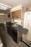 The kitchen in the Swift Edge 476 Black Edition motorhome