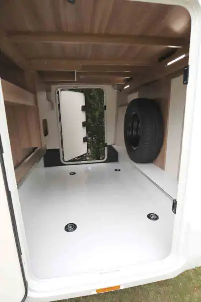 The garage, with spare wheel (Click to view full screen)