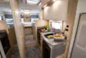 Showing the kitchen and bedroom in the Elddis Autoquest 194 motorhome