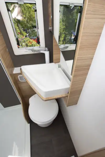 The washroom with basin in the Adria Sonic Axess 600 SL motorhome (Click to view full screen)