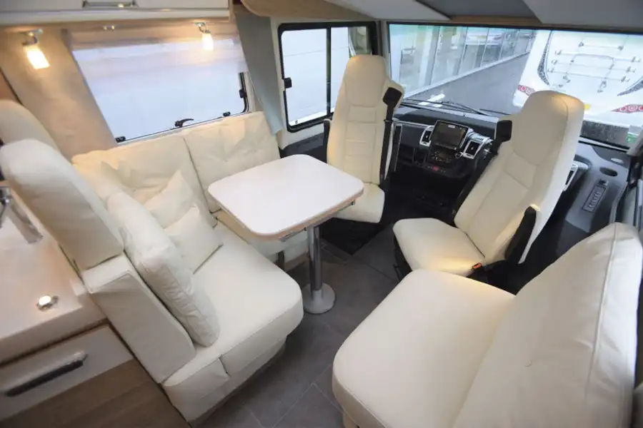 A view of the lounge and cab in the The Arto 78F motorhome  (Click to view full screen)