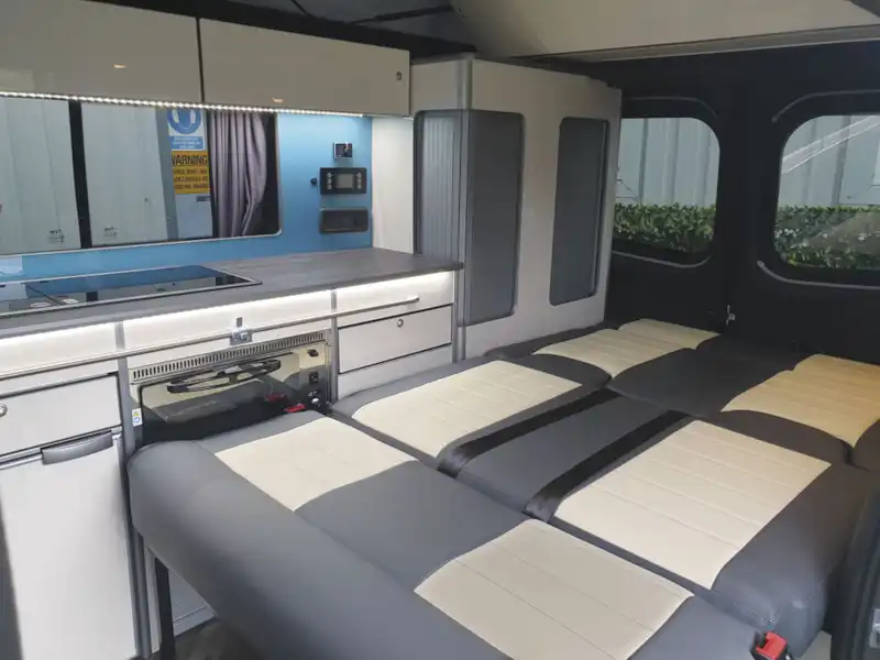 With seats folded down in the Calder Campers Renault Trafic Auto campervan (Click to view full screen)