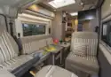 Seats and dining table in the WildAx Solaris XL campervan