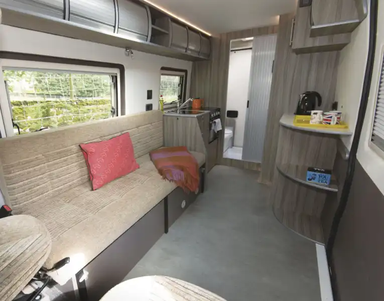 The settee and lounge in the The Axon Opportunity campervan  (Click to view full screen)