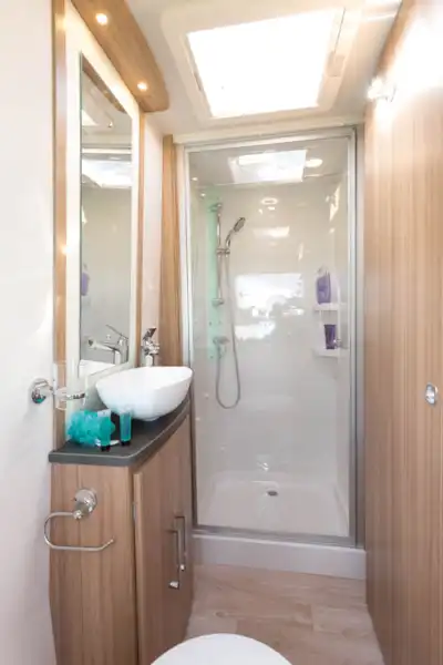It has a large shower with plenty of floor space (Click to view full screen)