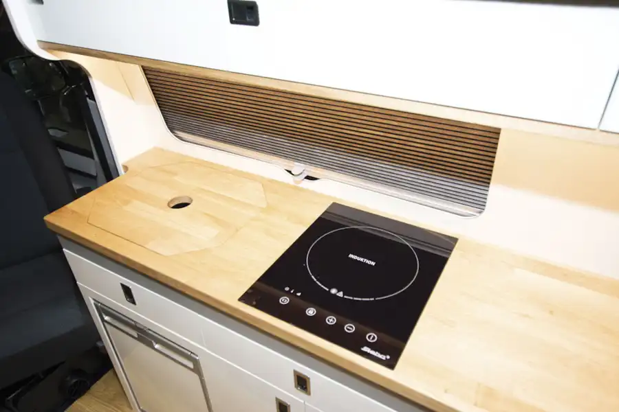The induction hob in the Three Bridge Tourer LWB campervan (Click to view full screen)