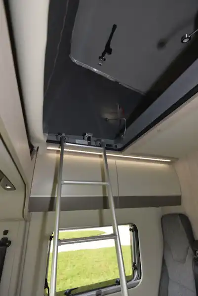 Ladder access to the bed in the pop-top roof of the Auto-Trail Adventure 65 campervan (Click to view full screen)