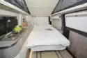 The bed in the WildAx Proteus campervan