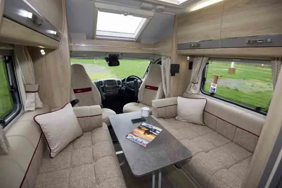 The Elddis Majestic lounge with dining table out (Click to view full screen)