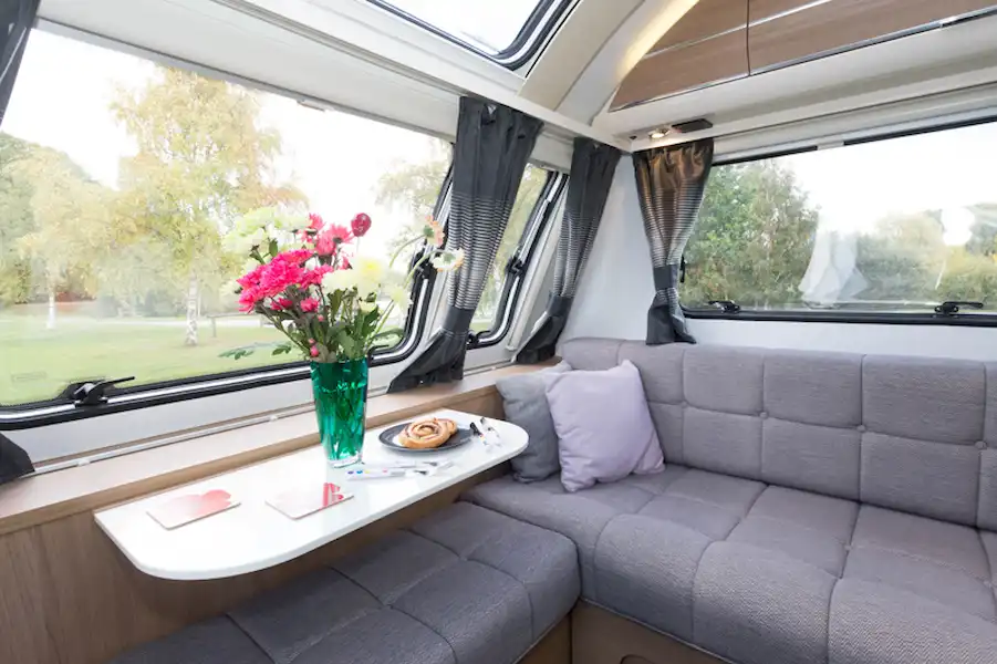 The coffee table hinged at the front of the caravan is 76cm wide and 35cm deep (Click to view full screen)