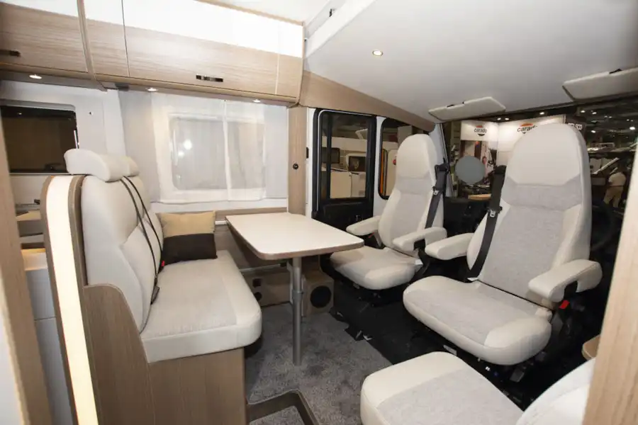 The lounge, with cab seats turned to face, in the Carado I338 Clever A-class motorhome (Click to view full screen)