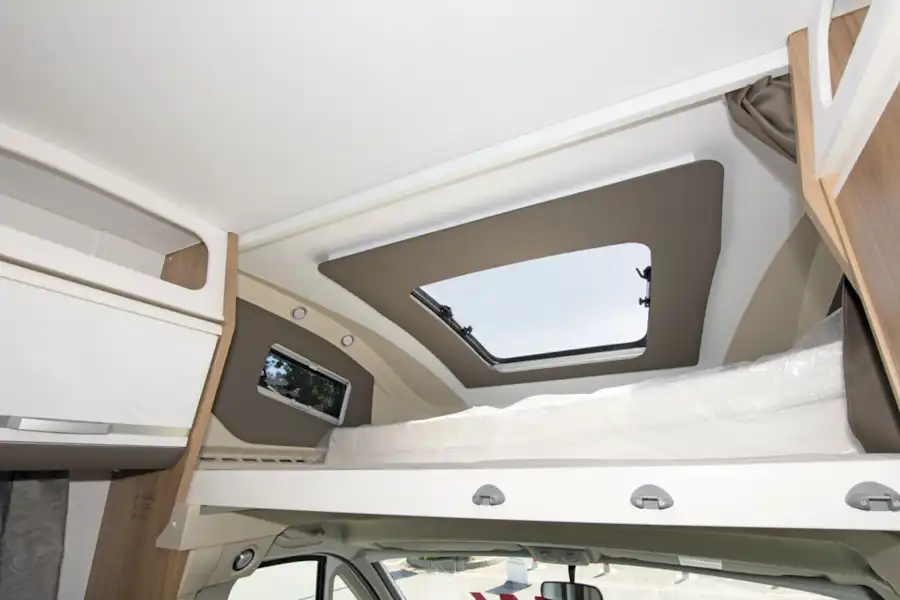 The raised bed in the Adria Coral XL Plus 600 DP motorhome (Click to view full screen)