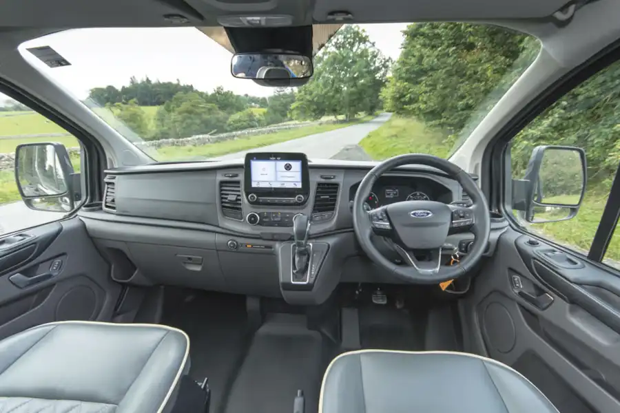 Behind the wheel of the WildAx Triton campervan (Click to view full screen)