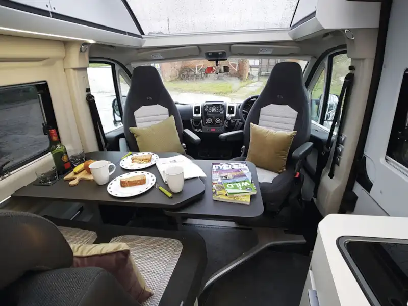 The lounge and cab in the Adria Twin Supreme 640 SGX campervan (Click to view full screen)