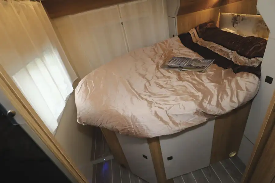 The double bed in the Roller Team T-Line 743 motorhome (Click to view full screen)