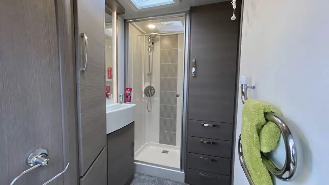 Wardrobes in the shower room of the Lunar Clubman ES caravan (Click to view full screen)