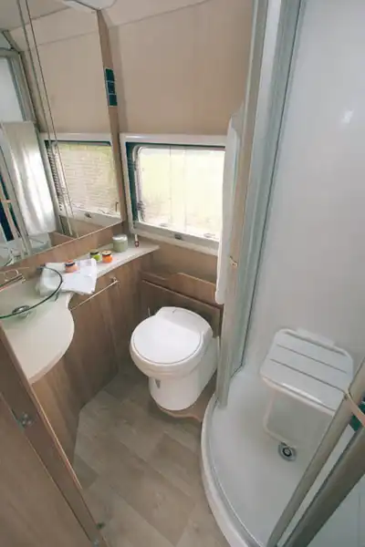 The washroom includes a shower stool (Click to view full screen)