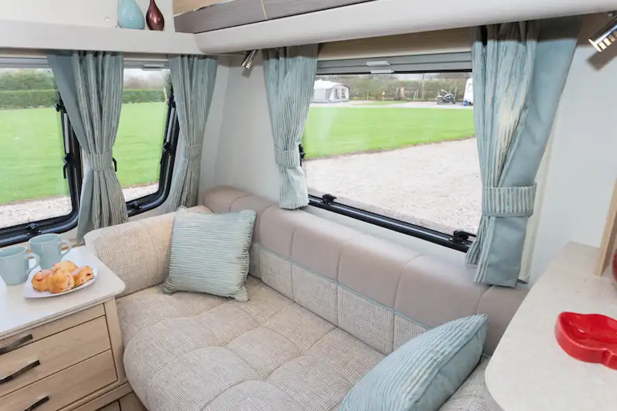 The unique Osprey fabric scheme features cushions and curtains with a subtle, light-reflecting pattern (Click to view full screen)