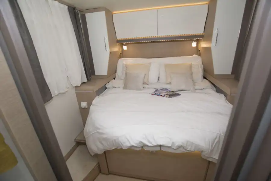 The double bed in the Rapido M96 motorhome (Click to view full screen)