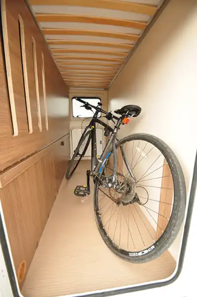 The garage can hold one bike - but not very well (Click to view full screen)