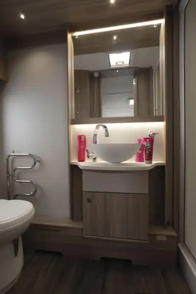 The washroom, with towel warmer, in the Coachman Acadia Xcel 830 caravan (Click to view full screen)