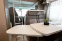 The extended table in the Benimar Primero 313 motorhome