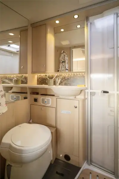 The washroom is equally as luxurious as the rest of the motorhome (Click to view full screen)