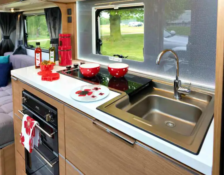It's a great kitchen except that the sink, at 28cm x 30 cm, is smaller than those in most in caravans (Click to view full screen)