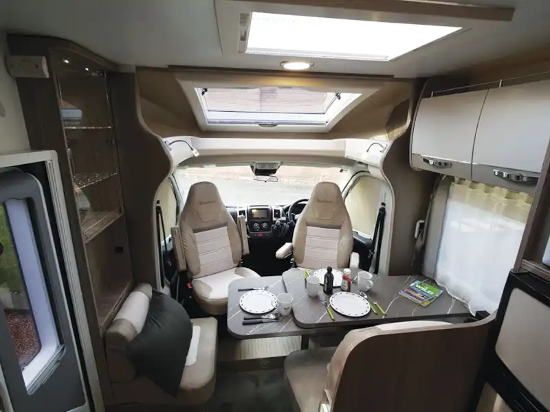 The lounge and cab area in the Benimar Mileo 231 motorhome (Click to view full screen)