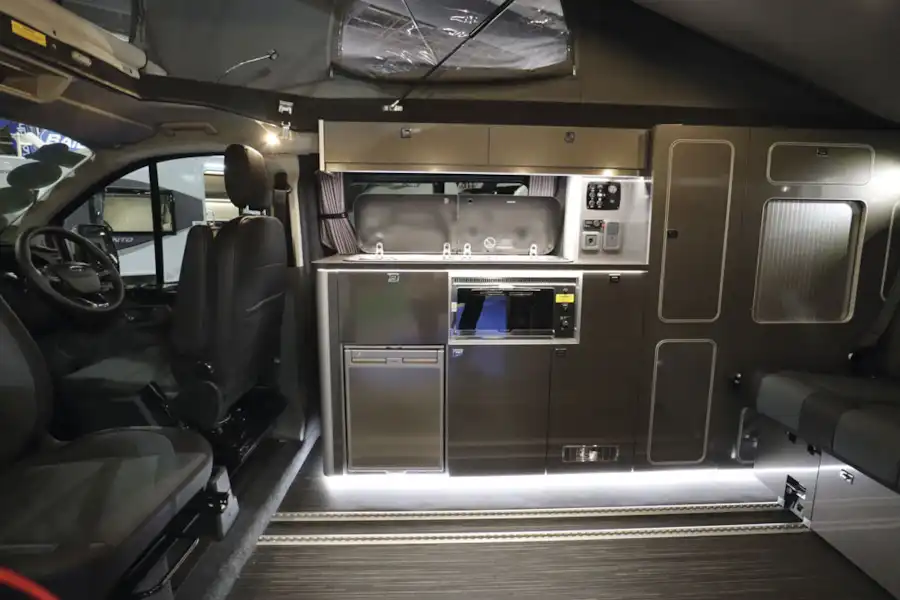 View of the kitchen in the Wellhouse Lowdhams Summit campervan (Click to view full screen)