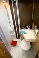Classy washroom hides a drop-down washbasin
