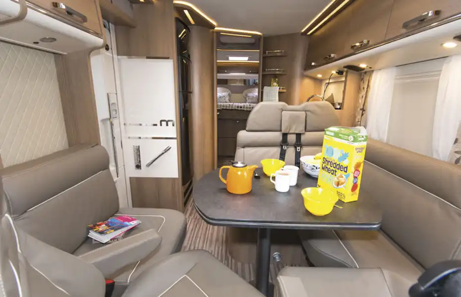 The lounge and living area in the Malibu I 500 QB Touring motorhome (Click to view full screen)