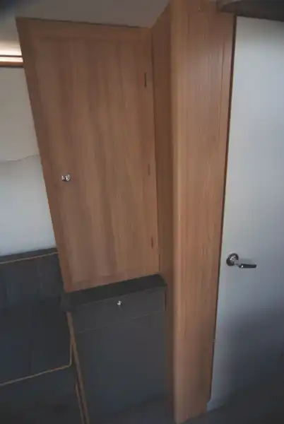 The wardrobe is deep enough and has a cabinet below it (Click to view full screen)