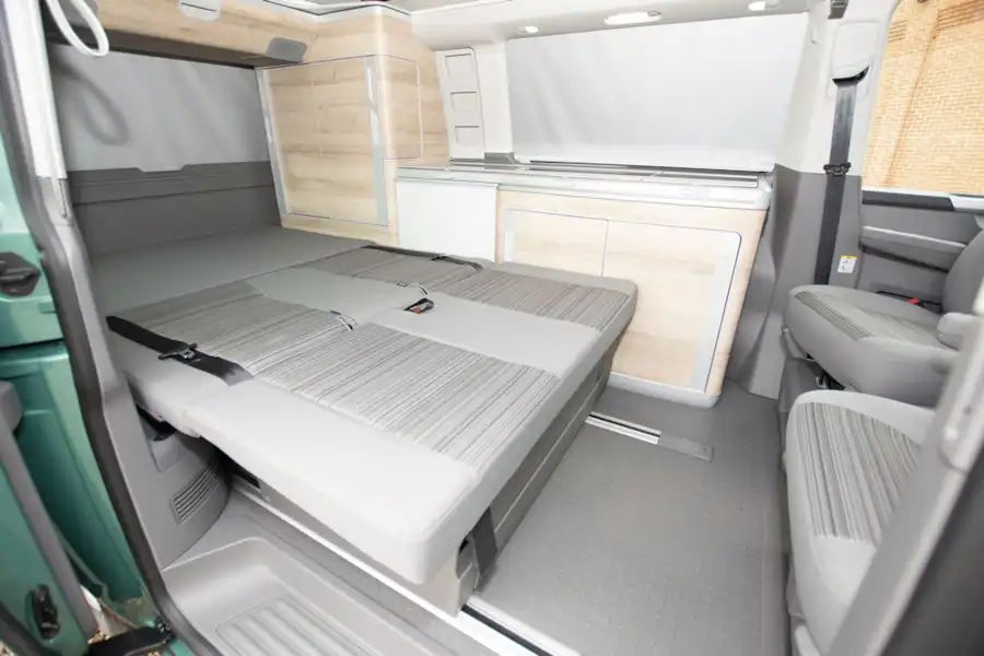 The fold down bed in the VW California Coast campervan (Click to view full screen)
