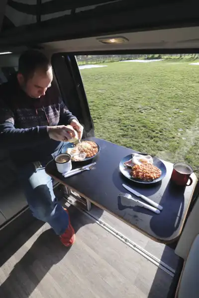 Enjoying breakfast in the HemBil Urban campervan (Click to view full screen)