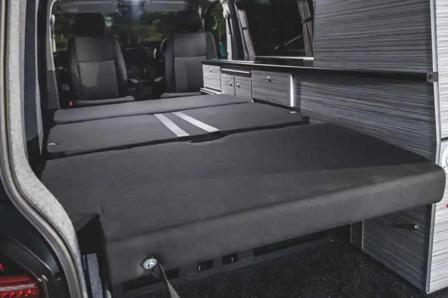 Rear seats folded down to make a bed (Click to view full screen)