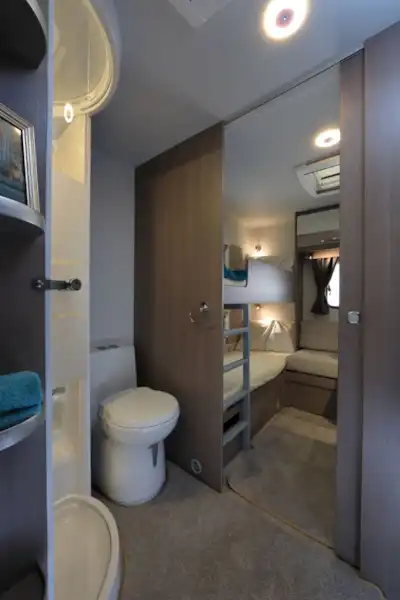 Spacious washroom and rear bedroom (Click to view full screen)