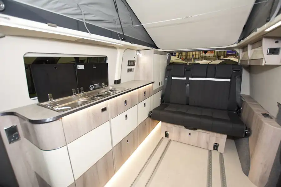 A view of the WildAx Proteus campervan, showing the kitchen (Click to view full screen)