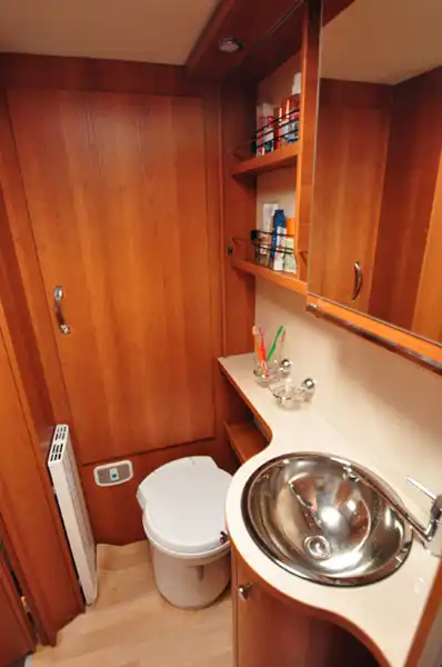 Plenty of storage space in a windowless washroom (Click to view full screen)