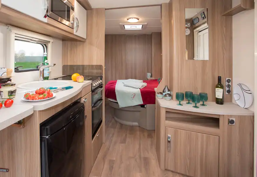 Even though this is a mid-length caravan the bedroom looks a long way from the lounge (Click to view full screen)