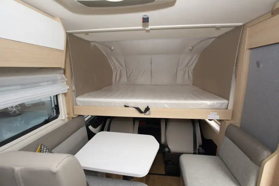 The drop down bed in the Hymer B-MC I 600 WhiteLine motorhome  (Click to view full screen)
